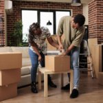 A couple is packing for moving long distance